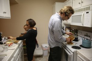 Jakub Zielkiewicz, Aimee Barnes and their 15-month-old son, Roman, at their home in Sacramento. “You basically just always feel like you’re doing a horrible job at everything,” Ms. Barnes said. Credit Jim Wilson/The New York Times